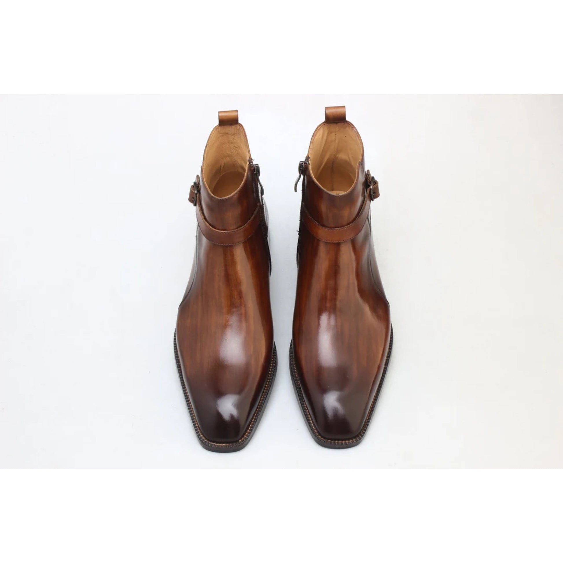 Close-up of Brown Leather Jodhpur Boots with ankle strap, highlighting the polished patina finish and refined stitching, designed for high-quality craftsmanship.