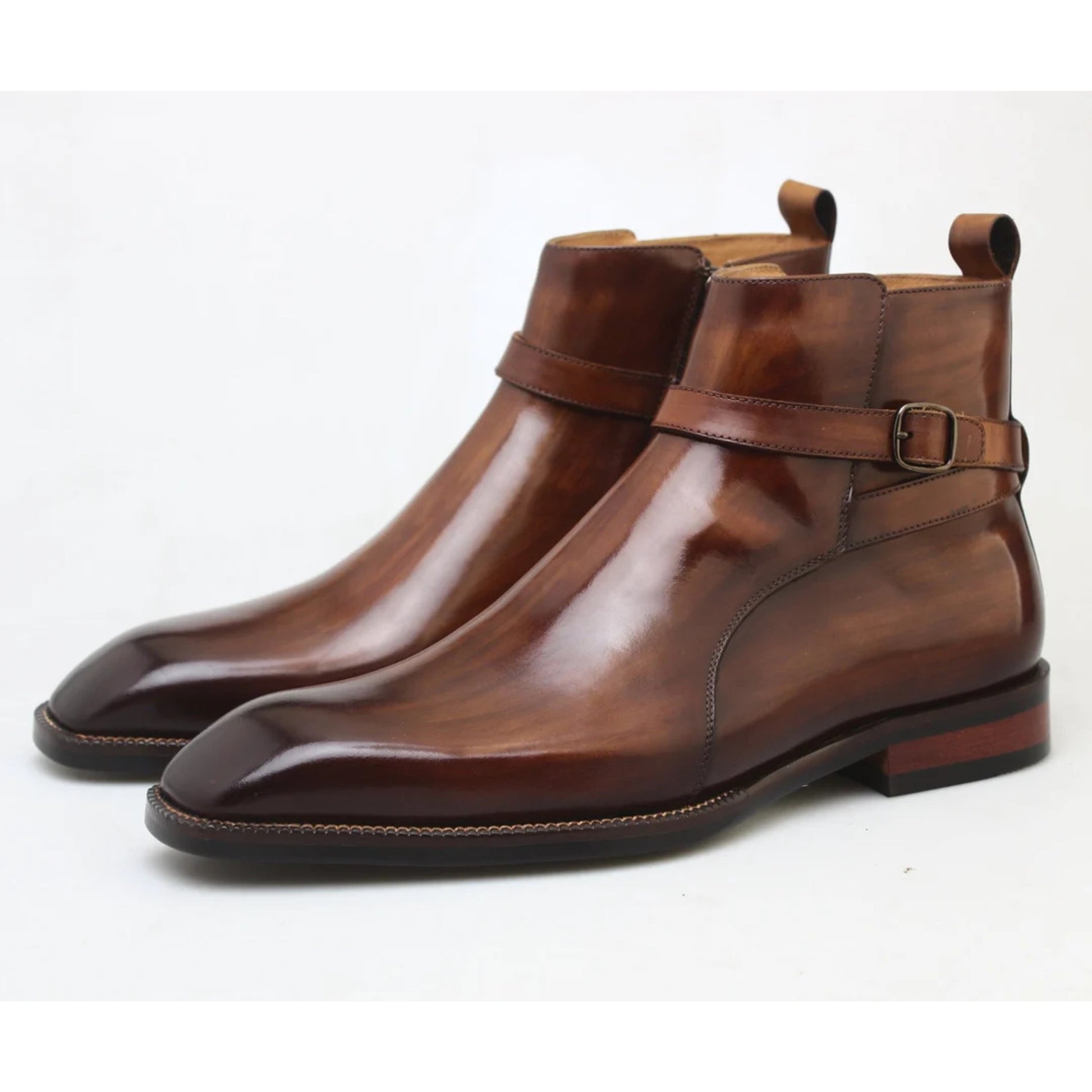 Front view of Brown Leather Jodhpur Boots with ankle strap, showcasing a smooth patina finish and refined craftsmanship for a sophisticated look.