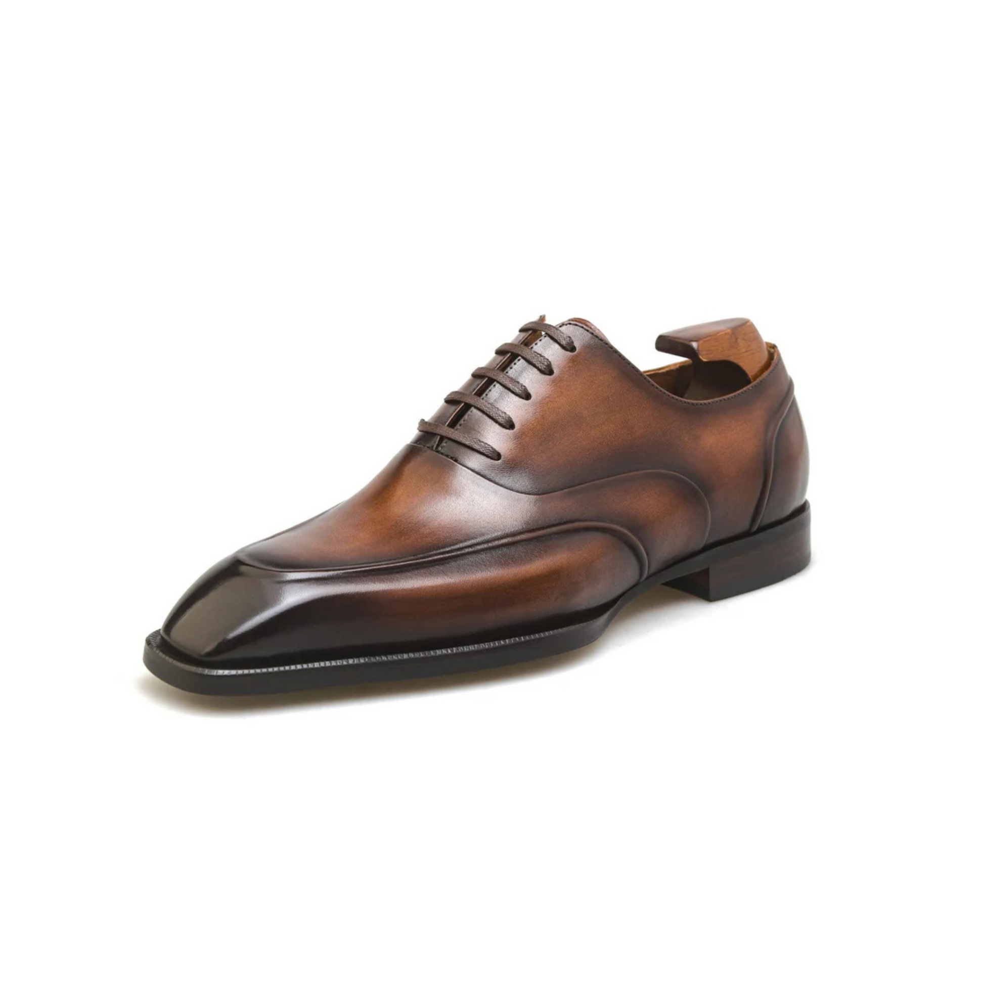 Front view of Hand-Polished Brown Wholecut Oxford Shoes, showcasing the seamless wholecut design and refined patina finish for a sophisticated formal look.