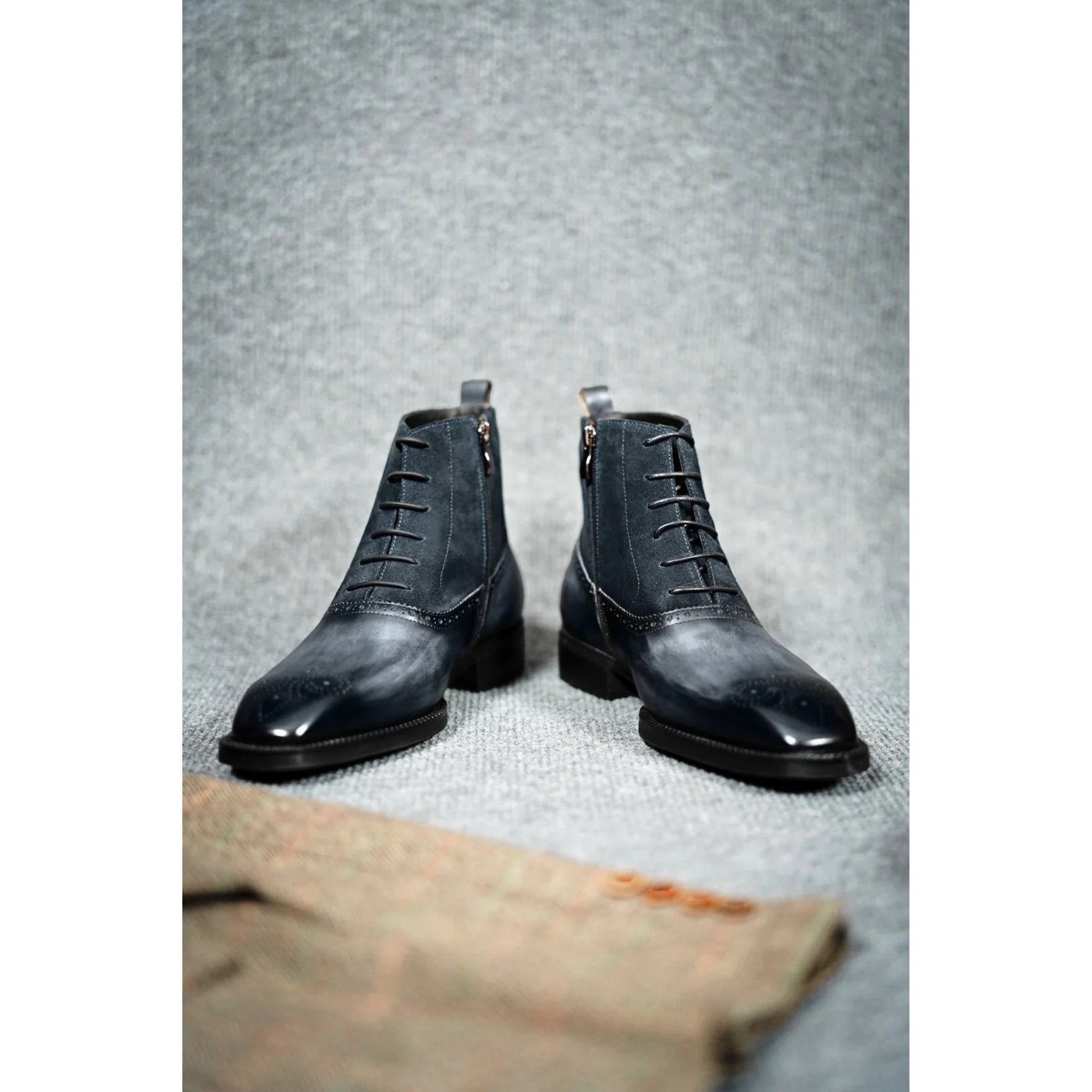 Side view of Luxury Black Leather & Suede Monk Boots, featuring a side zipper, lace-up design, and sleek croc leather finish for a sophisticated look.