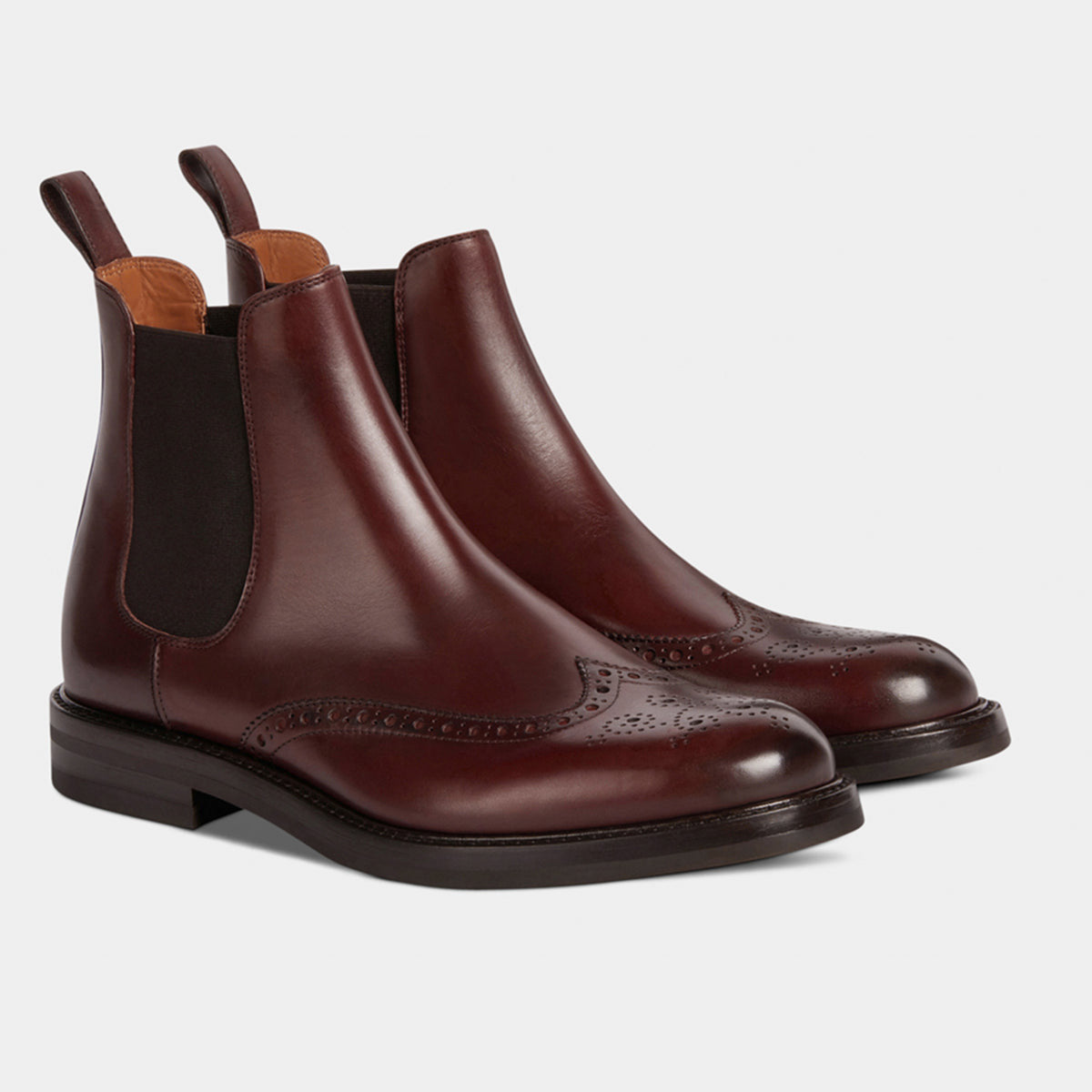 Brown Leather Brogue Chelsea Boots with detailed brogue pattern and elastic side panels, showcasing premium craftsmanship and timeless design.